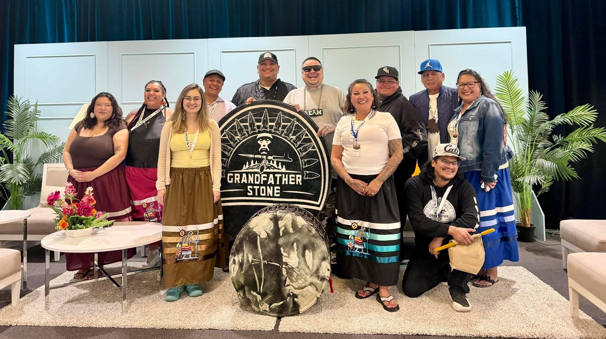 The Grandfather Stone drum with drumsticks